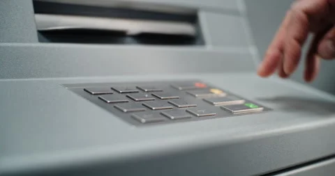 ATM Machine: Close Up of Unrecognizable Man Entering PIN Code for Cash Stock Footage 309285537