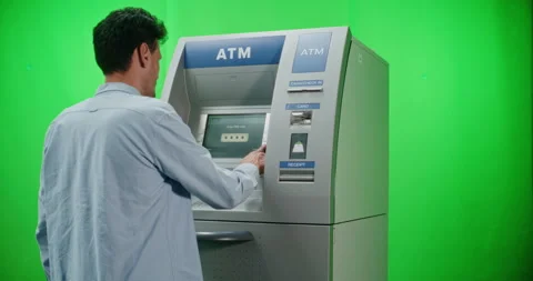 ATM Machine on Green Chroma Key Background: Man Performing Cash Withdrawal Stock Footage 309315089