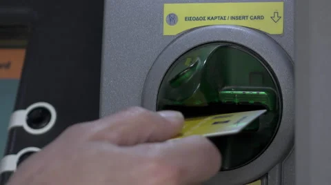 Atm machine inserting card in slot  Stock Footage 57659840