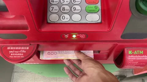 ATM machine withdraw money. Hand take Thai baht bank money slot, Thailand Stock Footage 234056831