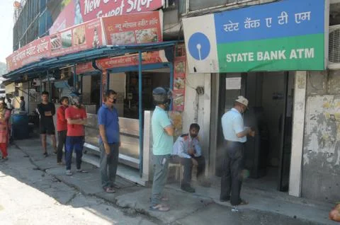 In at atm people in queue waiting. 스톡 사진