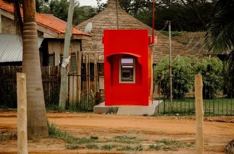 An ATM in a poor Ghanaian village - (controversial picture shows the social d Stock Photos