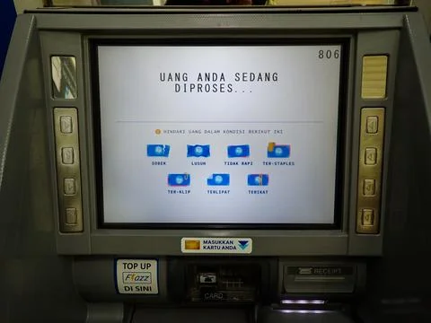 ATM Screen Displaying Money Processing Transaction and Banknote Conditions Stock Photos