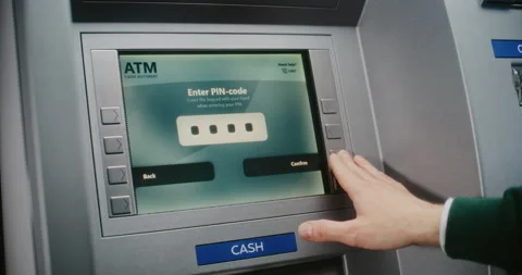 ATM User Entering PIN Code on ATM Keypad. Error Message on Cash Machine Due to Stock Footage 310117610