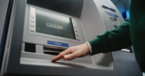 ATM User Entering PIN Code. Error Message on Cash Machine Screen Due to Lack of Stock Footage 310138932