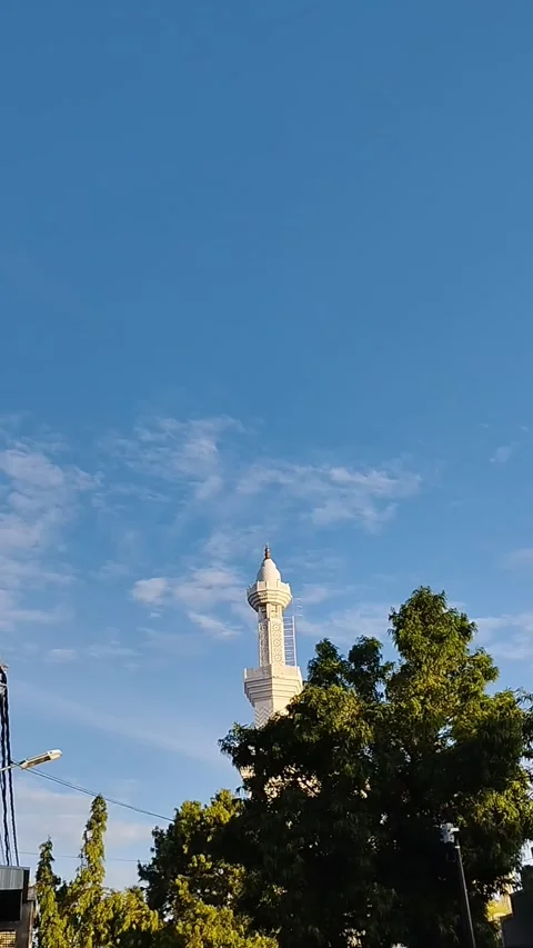 The atmosphere and the view of the mosque tower are very beautiful Stock Footage 226728526
