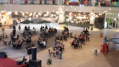 The atmosphere of a cafe in the middle of a mall Stock Footage 119798974