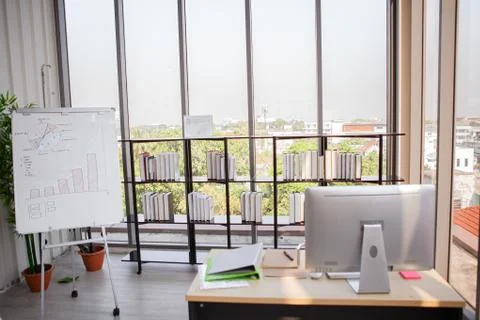 The atmosphere in an empty office accepting a policy to work from home in the Stock Photos