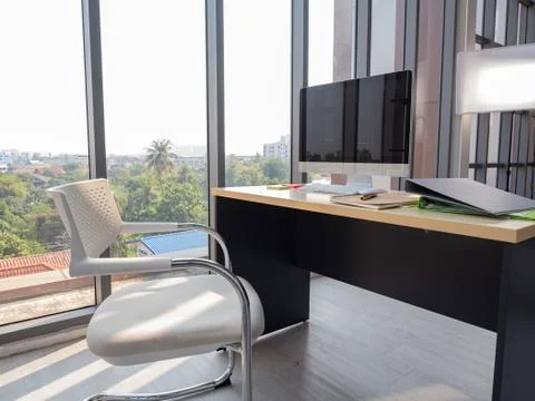 The atmosphere in an empty office accepting a policy to work from home in the Stock Photos