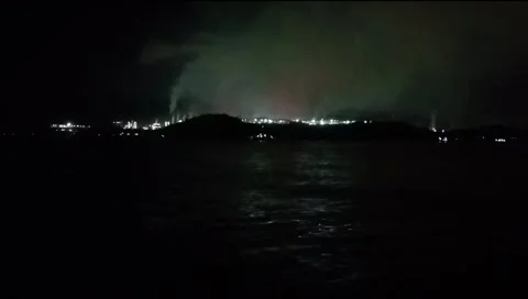The atmosphere of the harbor can be seen from afar with a background of darkness Video stock 277306431