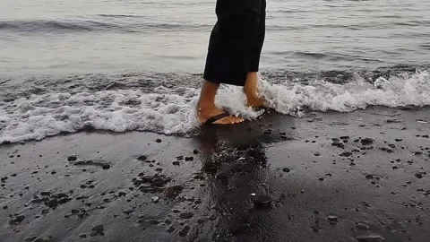 The atmosphere of sea waves when walking on the edge Stock Footage 225199849