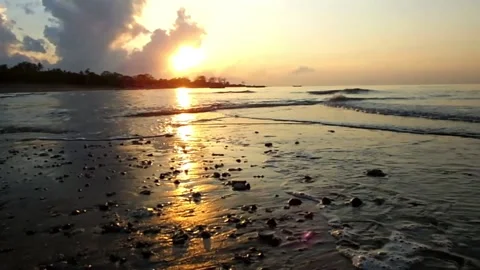 The atmosphere of the sunrise on the beach Stock Footage 151943948