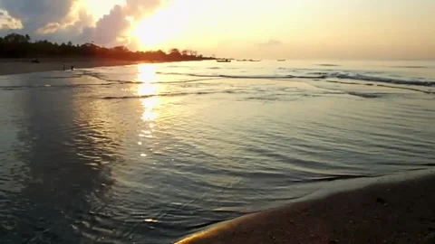 The atmosphere of the sunrise on the beach Stock Footage 151944027