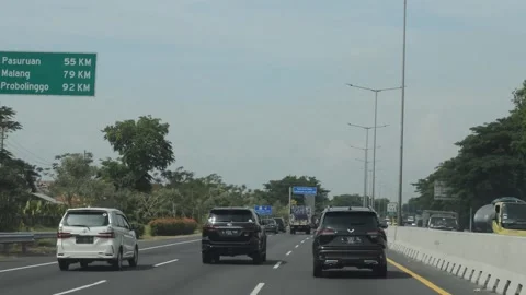 The atmosphere of the toll road in East Java Stock Footage 248407084