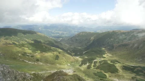 Atmospheric background mountain landscape with clouds. Stock Footage 217396428