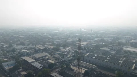 Atmospheric Drone Footage of Large Scale Industrial Area Under Thick Layer of Stock Footage 333606359