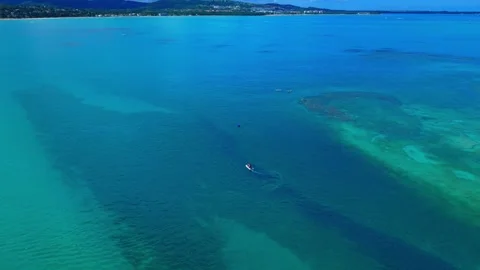 Atmospheric drone footage of passing clouds casting dramatic light and shadows Stock Footage 343956714