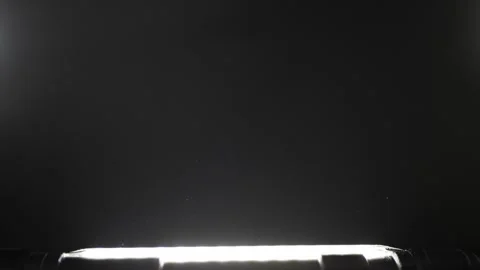 Atmospheric Dust Particles Floating in Light Beam Stock Footage 327555689