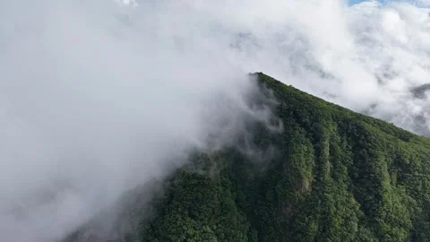 Atmospheric Forward Drone Shot of Misty Mountain Peak, South Korea Stock Footage 345867530