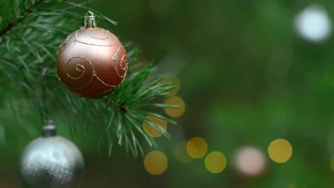 Atmospheric Holiday Loop with Glossy Bauble and Ambient Bokeh Lights Stock Footage 344405188