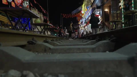 Atmospheric Night View Down Hanoi's Famous Train Street. Stock Footage 323766935