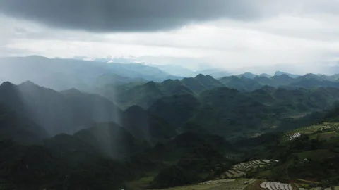 Atmospheric panning of Mộc Châu monsoon: Cumulonimbus clouds and high-plateau Stock Footage 324946151
