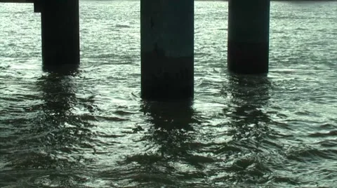 Atmospheric River Thames Under 3 Posts Stock Footage 8659091