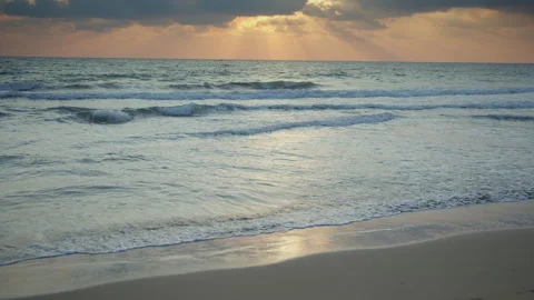 Atmospheric sunset over the sea. Reflection of the setting sun on the seascape Stock Footage 312762514