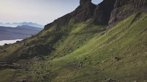Atmospheric top view of the high sharp cliffs towering over the lakes and the Stock Footage 141668604