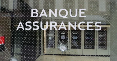 ATM's seen through damaged Societe Generale bank Stock Footage 246089417