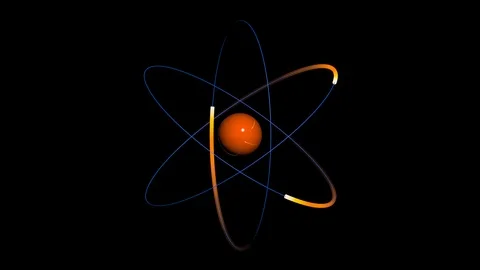 Atom - blue and orange atomic particle with electrons rotating around nucleus Stock Footage 104337744