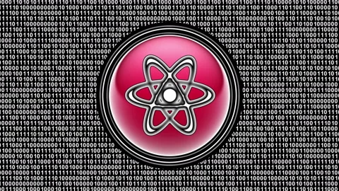 Atom icon. Binary code ( array of bits ) in the screen. Looping footage. Stock Footage 123900908