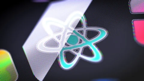 The atom icon on the Screen. 4K Resolution. Encoder Prores 4444. Looping. Stock Footage 86128124
