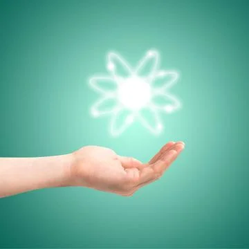 Atom structure model in hands Atom structure model in a hand with nucleus ... Stock Photos