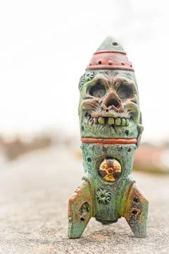 Atomic nuclear bomb with a skeleton face grinning with a radiation symbol and bl Stock Photos