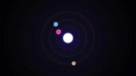 Atomic orbits with colorful electrons spinning around nucleus in dark space.. Stock Footage 340912714