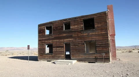 ATOMIC TESTING HOUSE WOOD HOUSE IN NEVADA DESERT Stock Footage 48001093