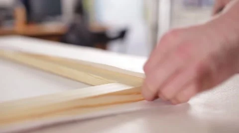 Attach a picture stapler Stock Footage 67670266