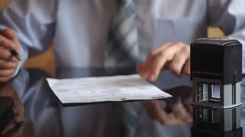 Attach a seal to a document Stock-Footage 34668384