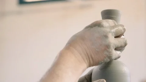 Attaching clay's decorations on a vase Stock Footage 87031375