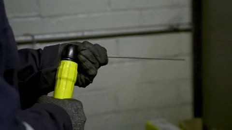 Attaching End of Plasma Cutter Stock Footage 151490524