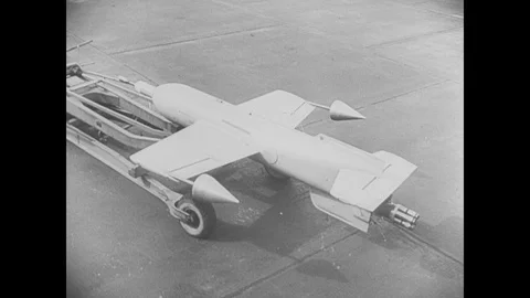 Attaching Henschel 293 air-to-surface rocket to plane Stock Footage 103383689