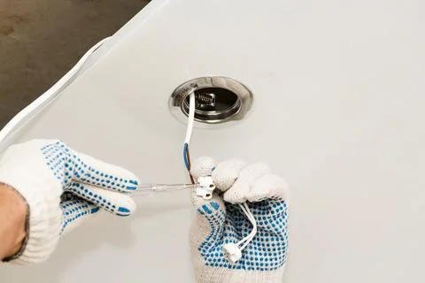 Attaching the lamp holder. Stock Photos