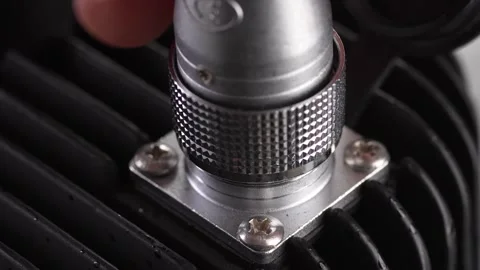 Attaching Power Cable to Device Connector. Stock Footage 256236559