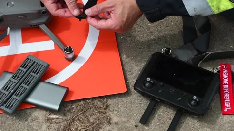 Attaching propellors to the motors of a drone Stock Footage 156506014