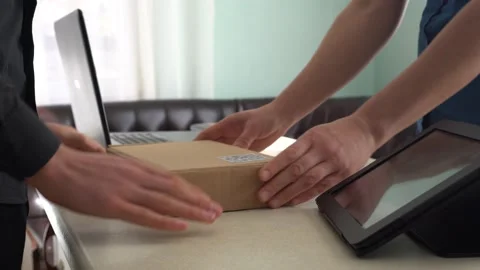 Attaching a QR code to delivery or package. QR code scanning app Video stock 145113018