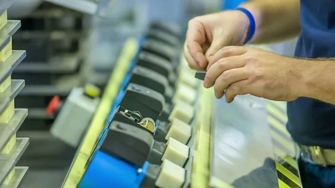 Attaching something with another tool Stock Footage 77122185