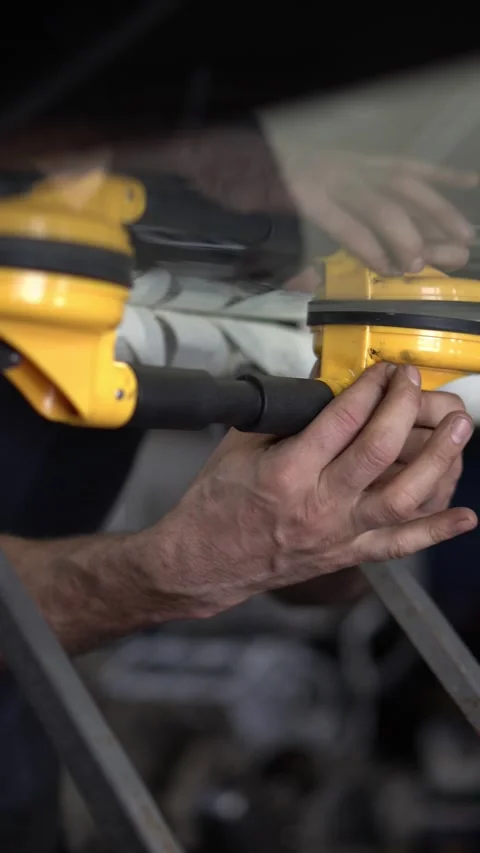 Attaching a vacuum holder to a glass surface Stock Footage 314793919