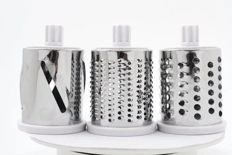 Attachments Mechanical grater on a white background. Stock Photos