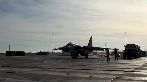 Attack aircraft Su-25SM (NATO: Frogfoot) steers in direction of runway. Close-up Stock Footage 122734320